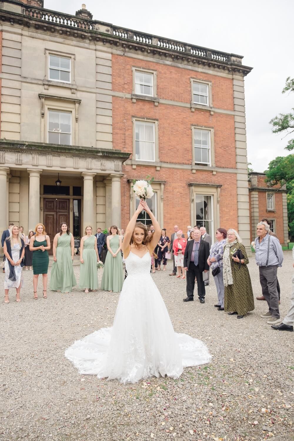 The bouquet toss at Netley Hall