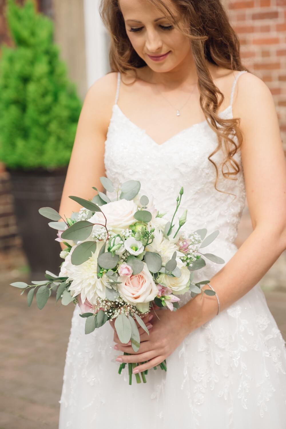 Annabelle with her bouquet before the ceremony