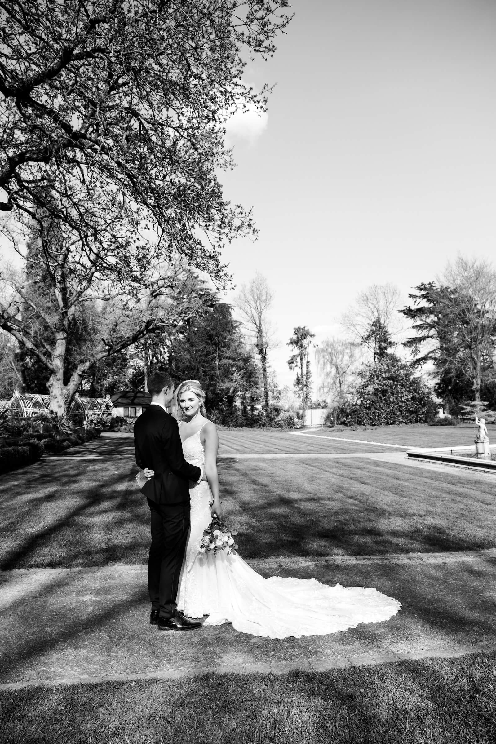 Black and white couple portrait of the bride and groom at Moxhull Hall