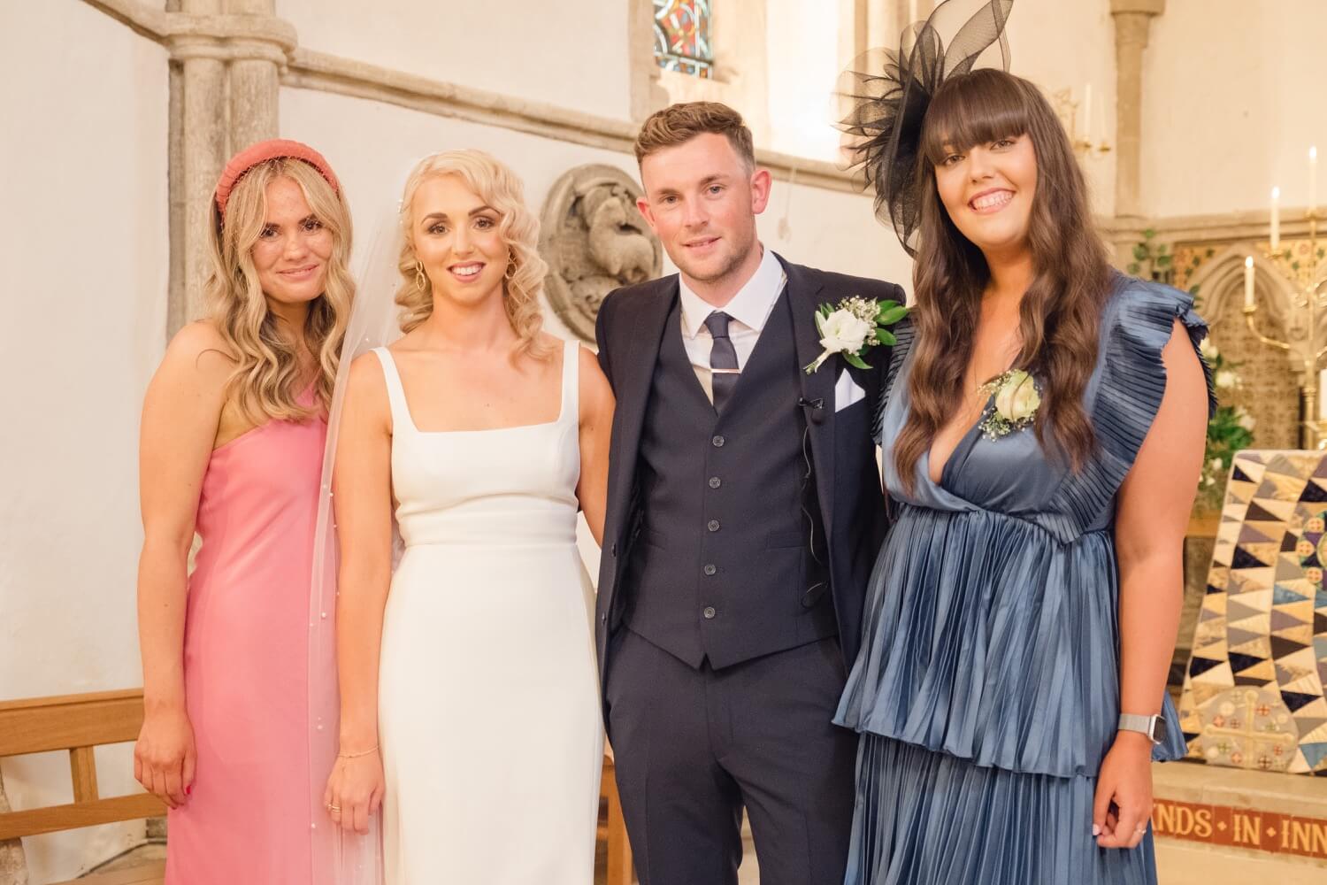 Bride and groom with their witnesses at the ceremony near The Great Barn, Aynho