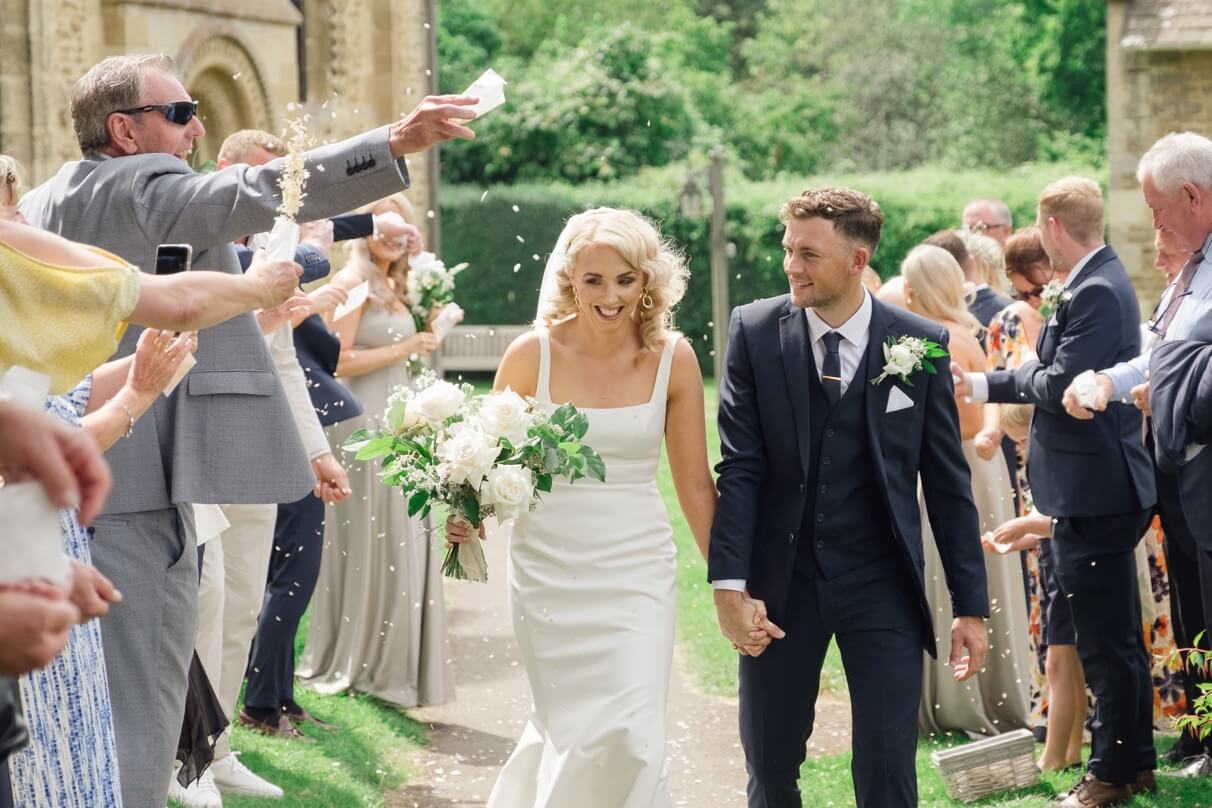 Confetti outside the church after a Great Barn Aynho wedding