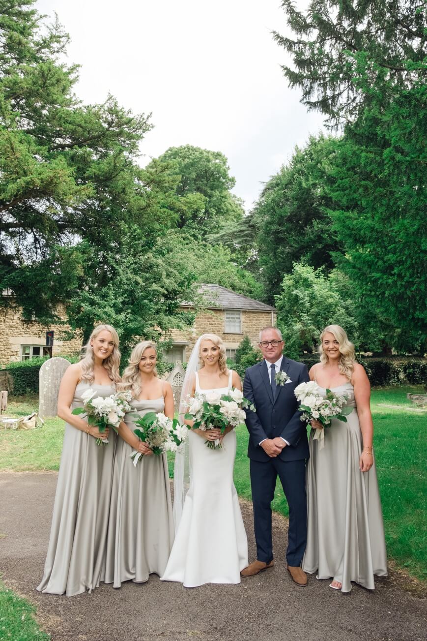 Bridal party at the church before a Great Barn Aynho wedding