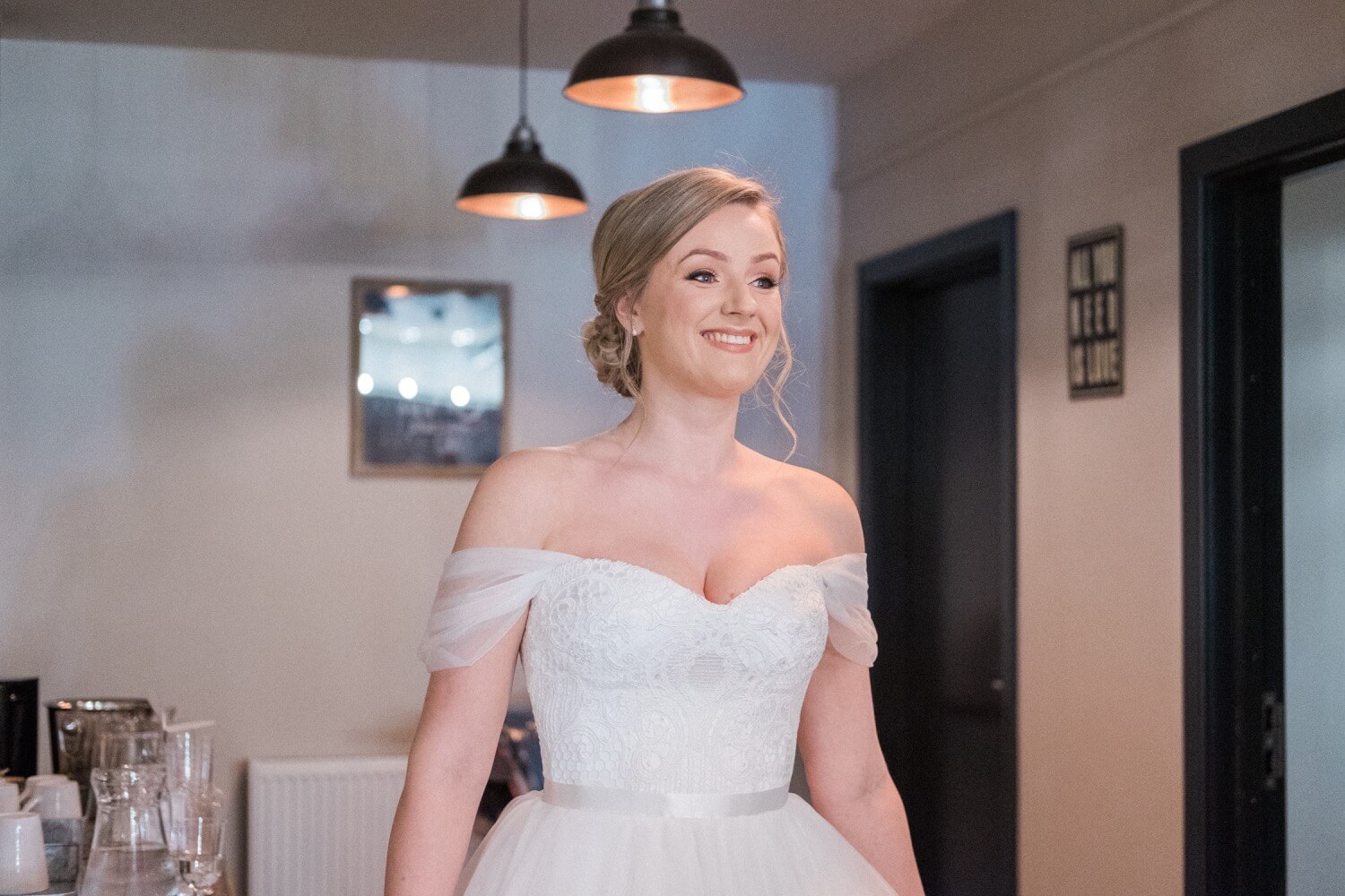 Bride in her dress before the ceremony at The Mill Barns