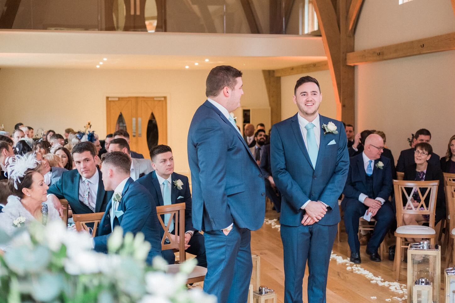 Groom waiting with his best man at the start of the ceremony