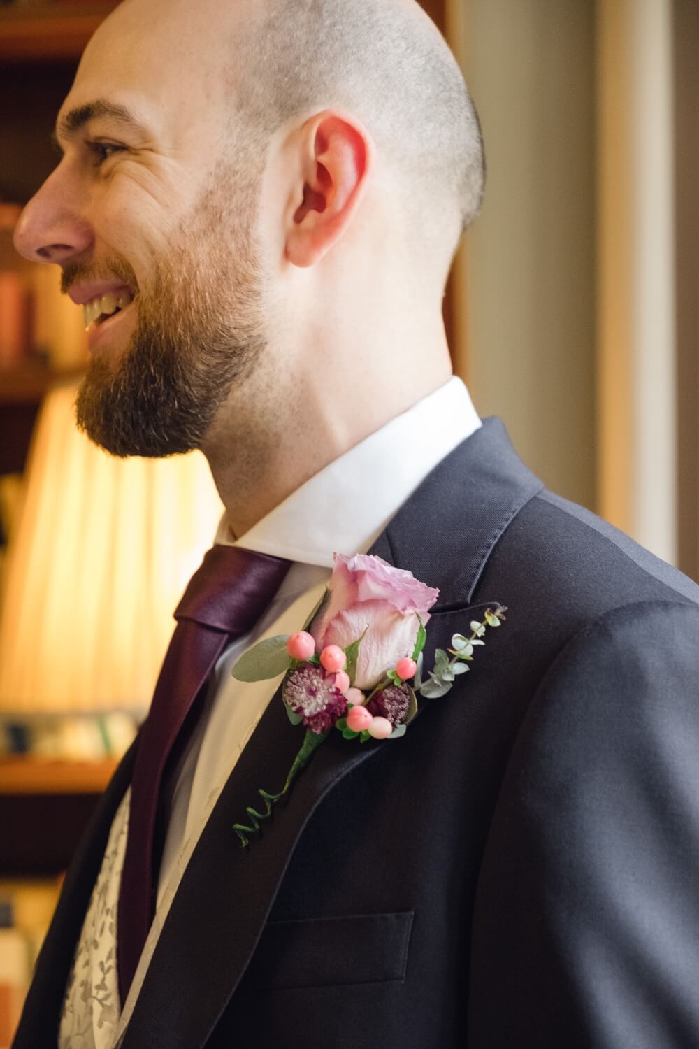 Groom laughing before the ceremony