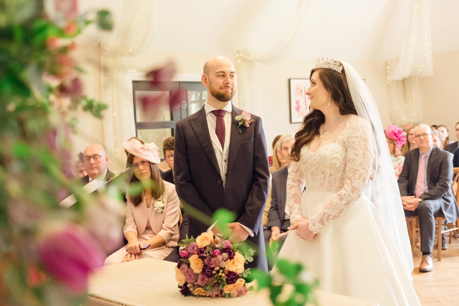 Bride and groom at the start of the ceremony at The Pear Tree Purton