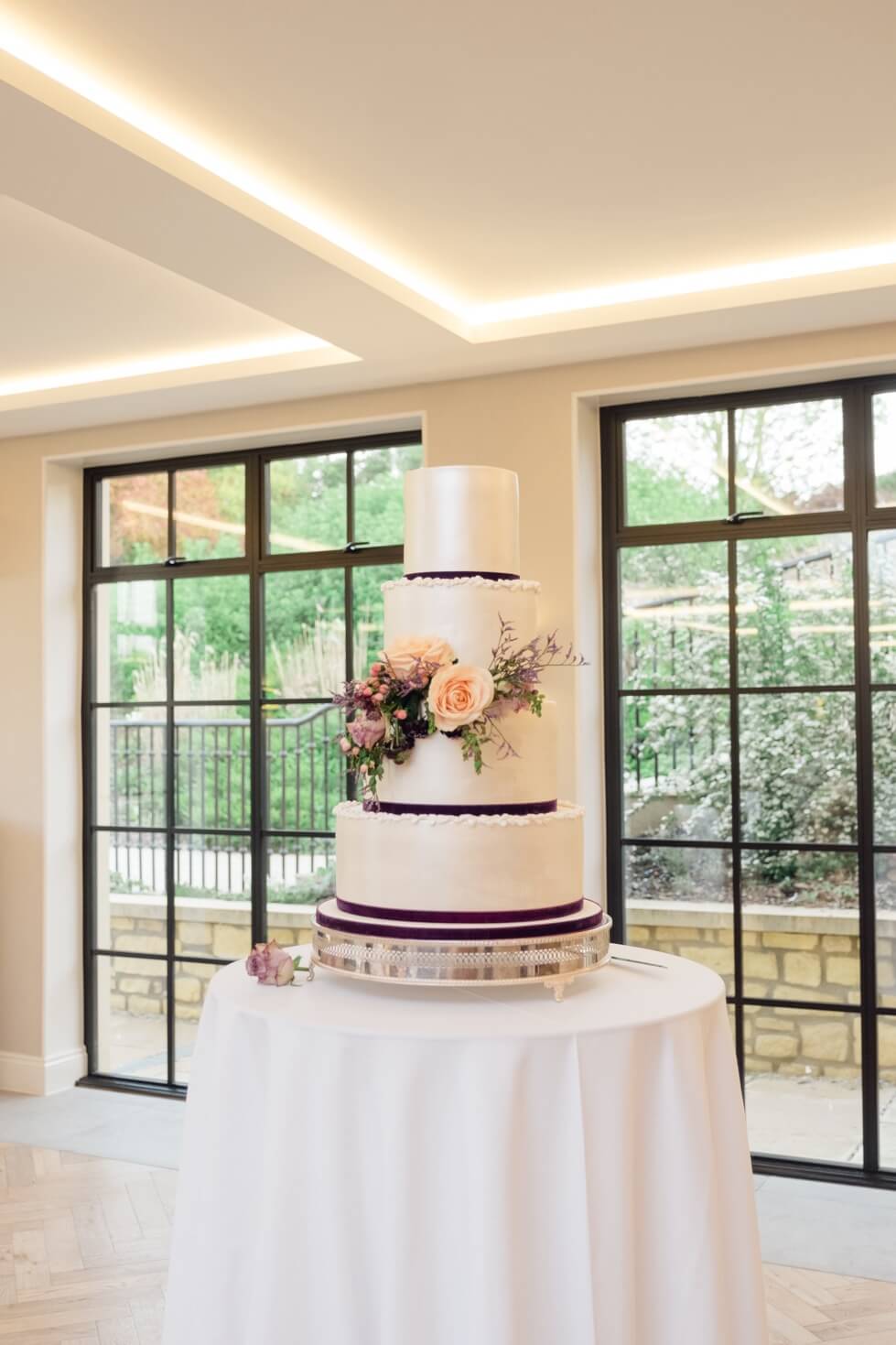 Cutting the wedding cake at The Pear Tree Purton