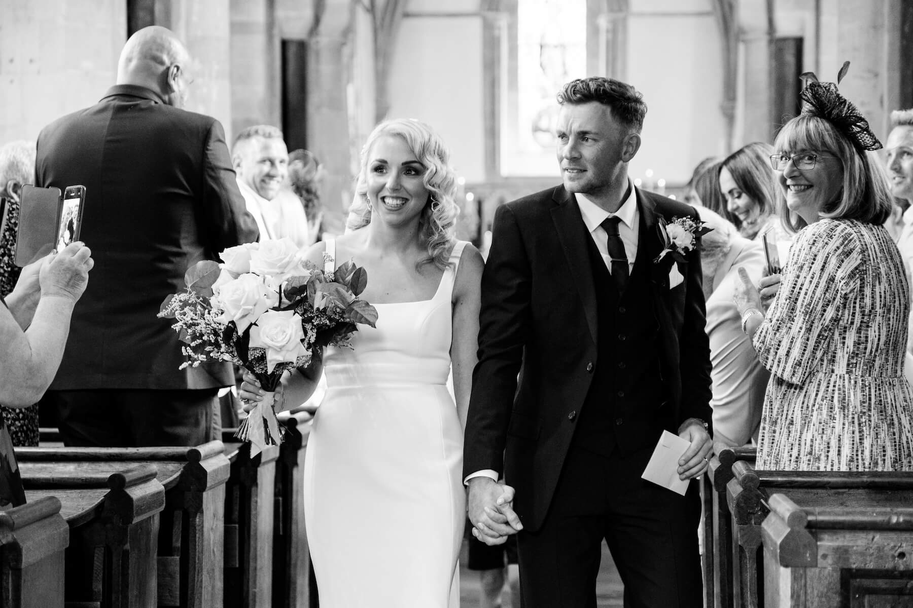 Georgina and Piers' wedding ceremony at a village church near The Great Barn, Aynho