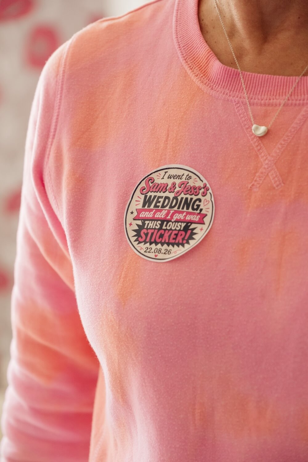 A novelty wedding sticker on a jumper during getting ready