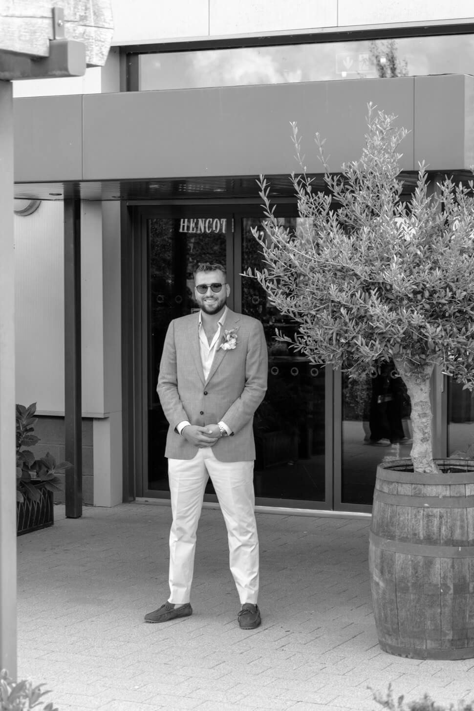 The groom waiting outside the venue before the ceremony
