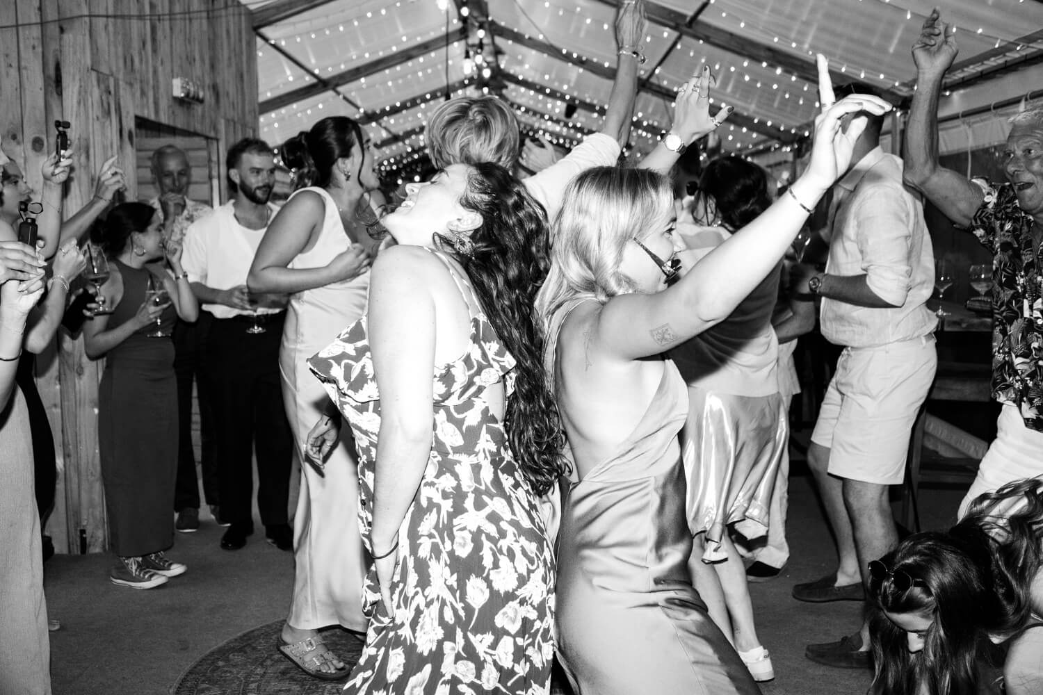 A group dancing at the evening reception