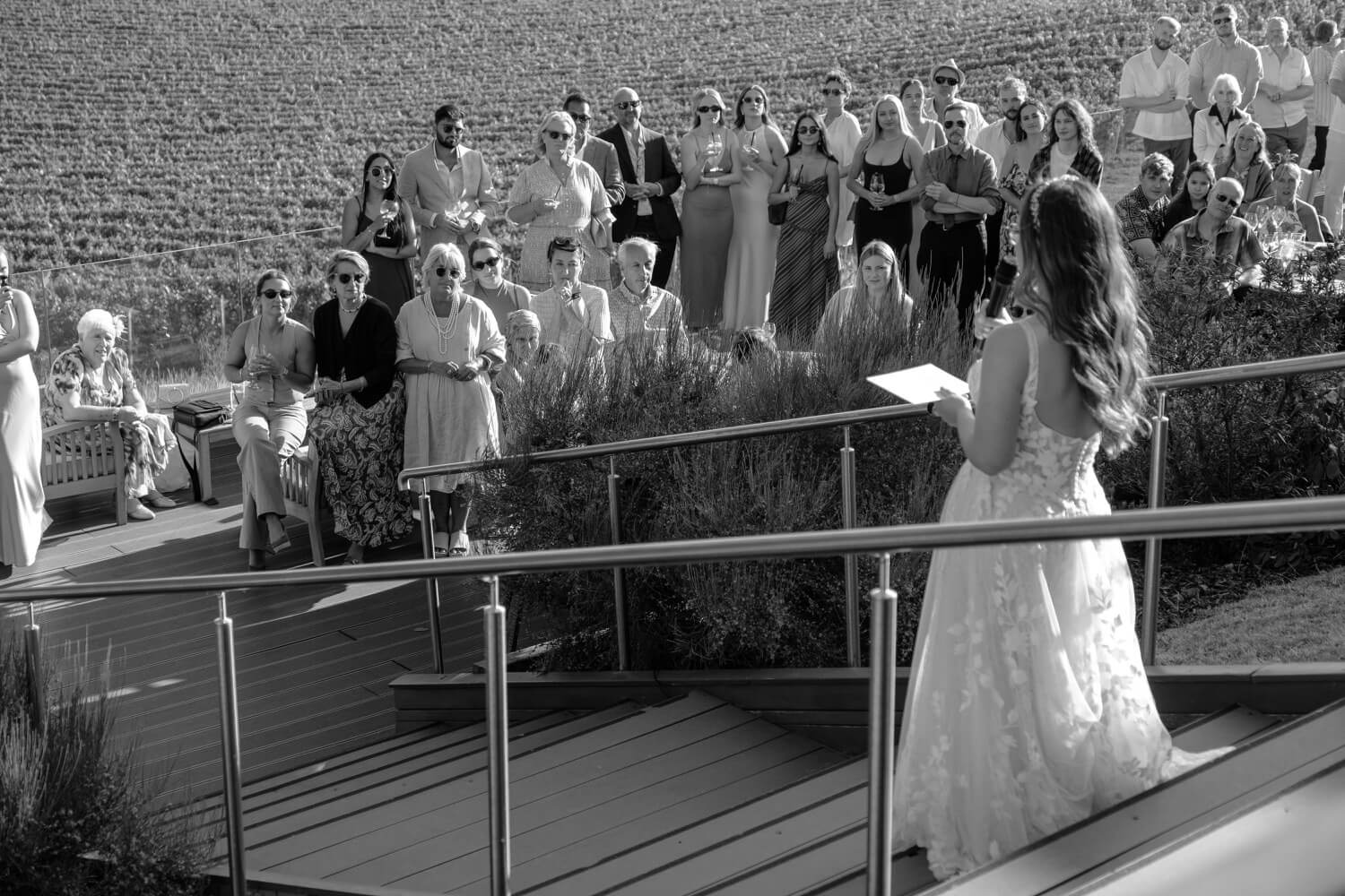 The bride giving a speech on the terrace