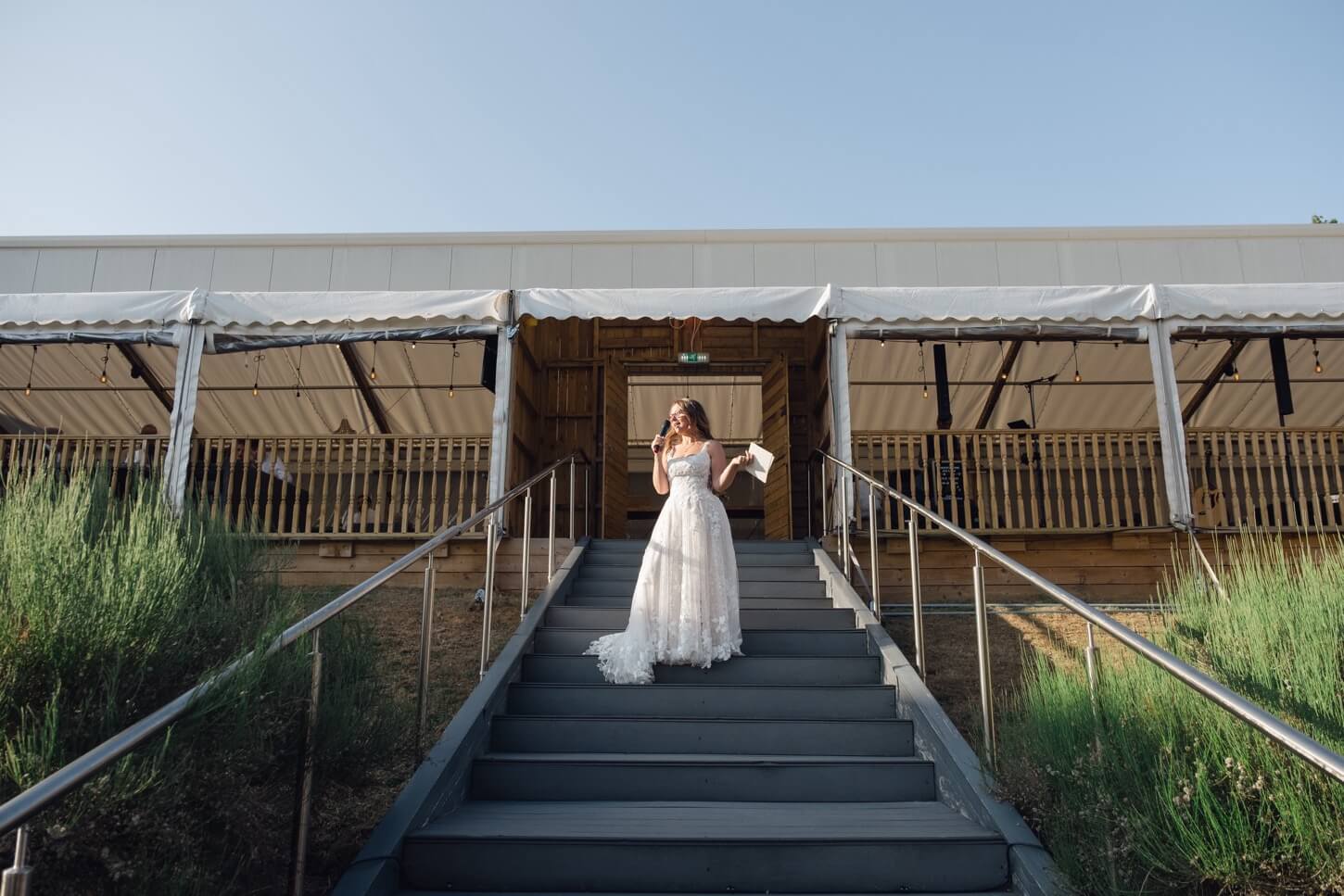 The bride's speech with the vineyard behind